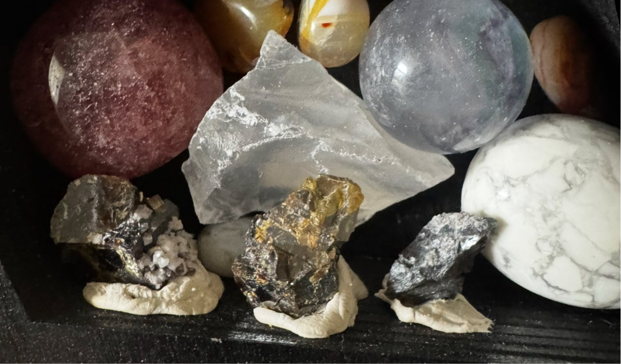 Assorted crystals and mineral specimens.