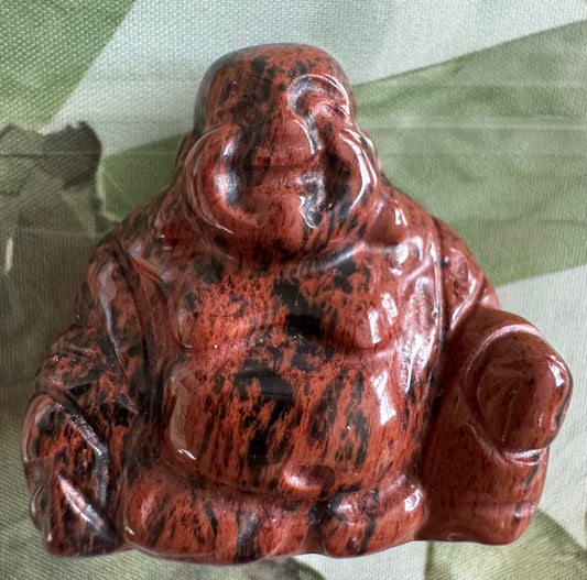 Red and black Buddha statue.