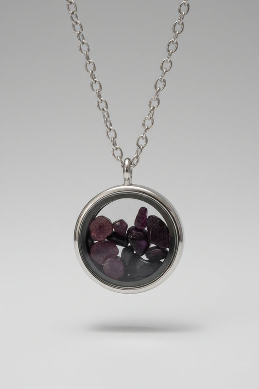 Silver and glass round locket filled with crystals locket on a silver chain