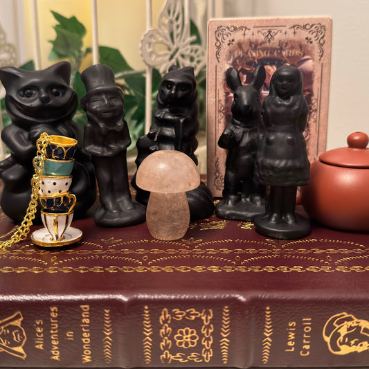 Alice in Wonderland crystal figurine set with obsidian and quartz pieces