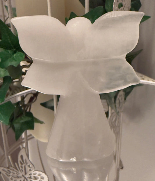 White Calcite angel carving A side view