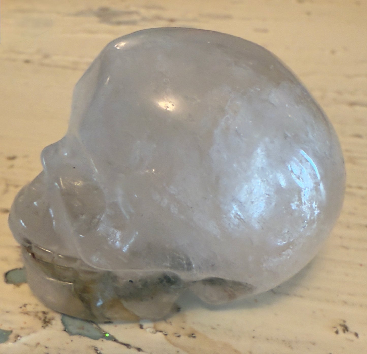 Clear Quartz Skull carving with moss agate inclusions