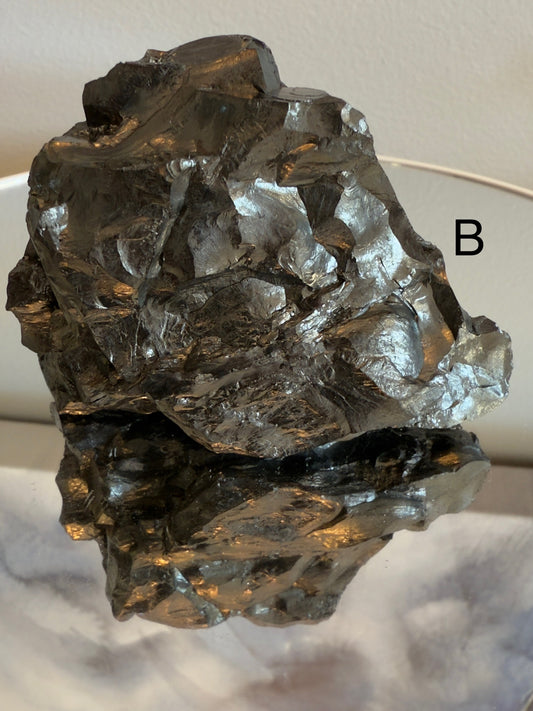 Natural shungite crystal healing stone for EMF protection, grounding, and energy balance