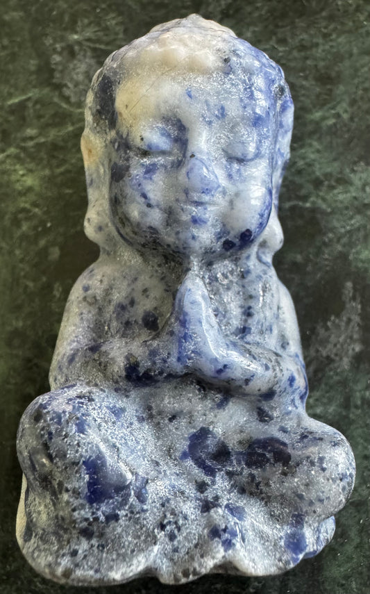 Blue and white stone Buddha statue.