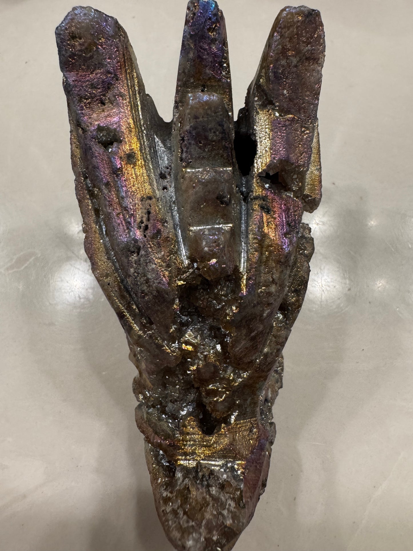 Iridescent bornite mineral with crystalline structure.