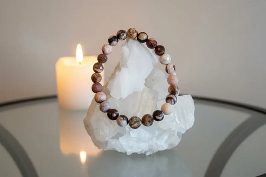 Picture Jasper Bead Bracelet 8mm round stones on a crystal, with a candle