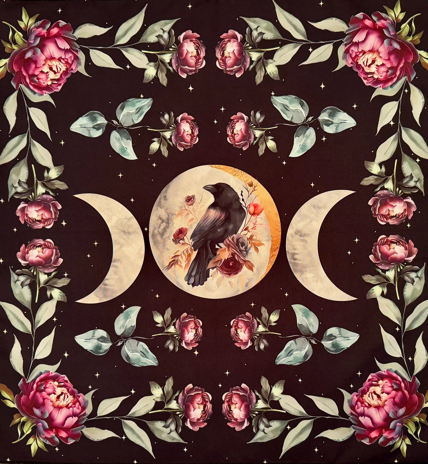 Square dark brown tapestry with triple moon, raven, and floral design.