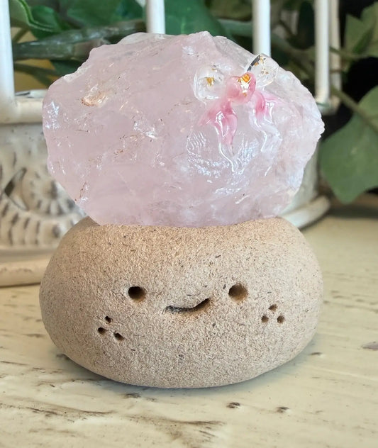 Mini smiling crystal head rock decor side view