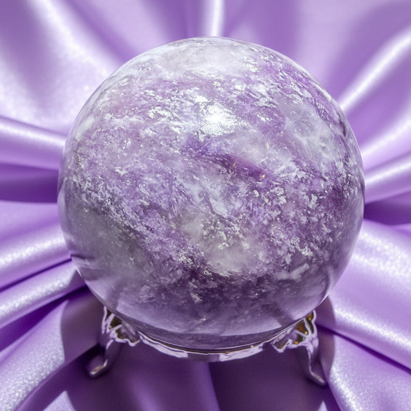 close up looking down at lepidolite sphere