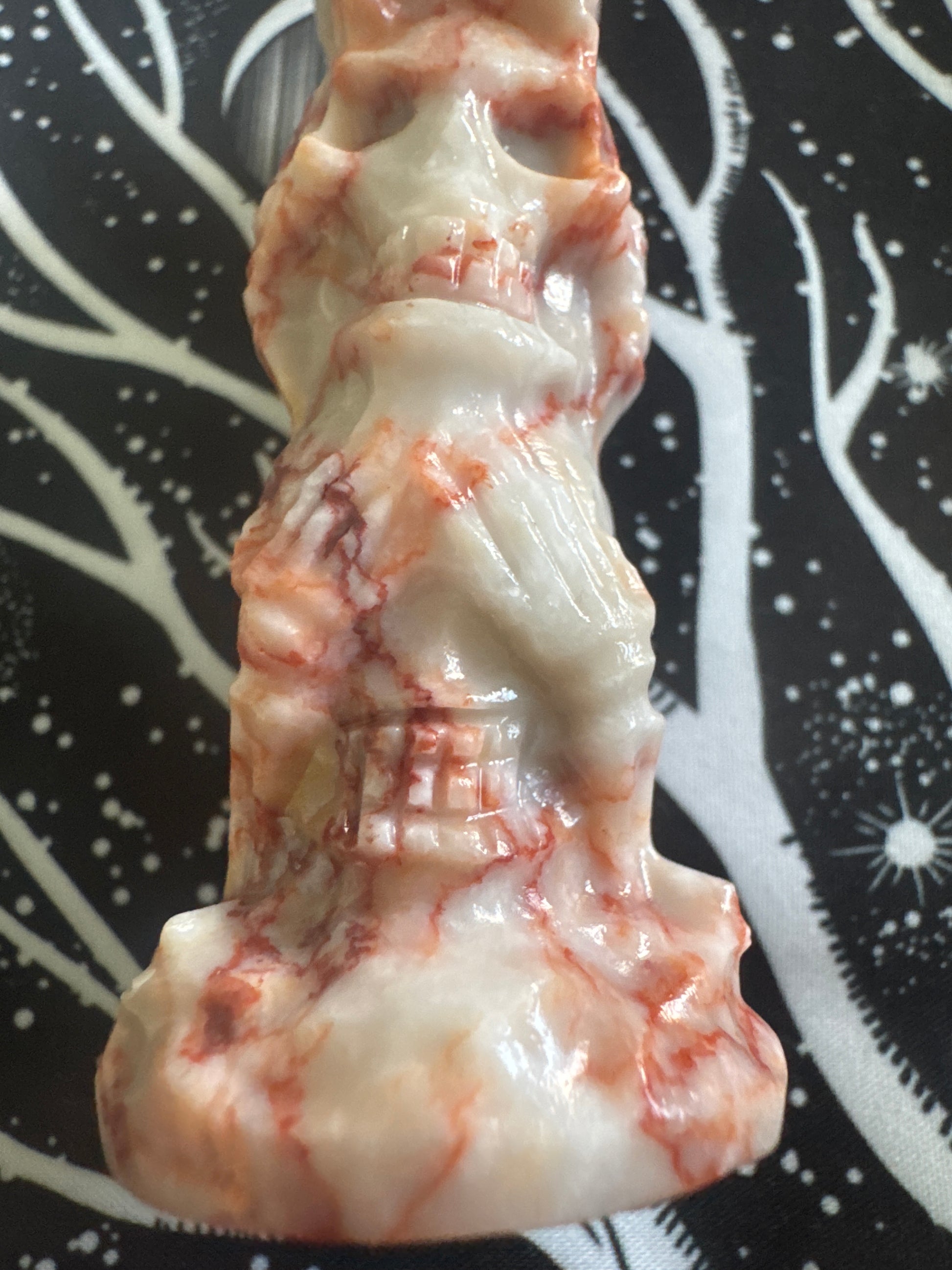 Carved marble skull sculpture.
