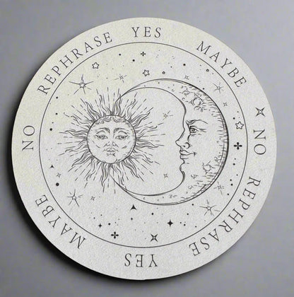 Round pendulum board featuring a sun and moon design with the words "Yes", "No", "Maybe", and "Rephrase".