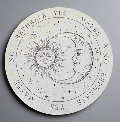 Round pendulum board featuring a sun and moon design with the words "Yes", "No", "Maybe", and "Rephrase".