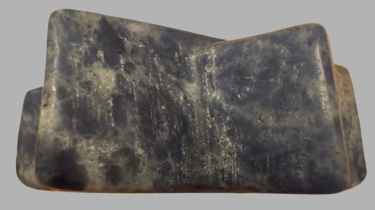 Blue and white marbled stone bookend.