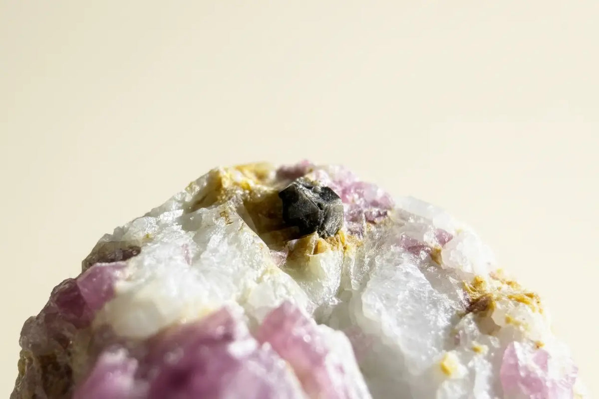 Elbaite Tourmaline specimen with black mineral inclusion