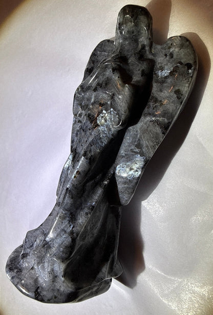 photo side view of larvikite carved angel high flash 