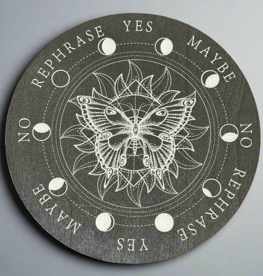 Ouija board with a butterfly design.