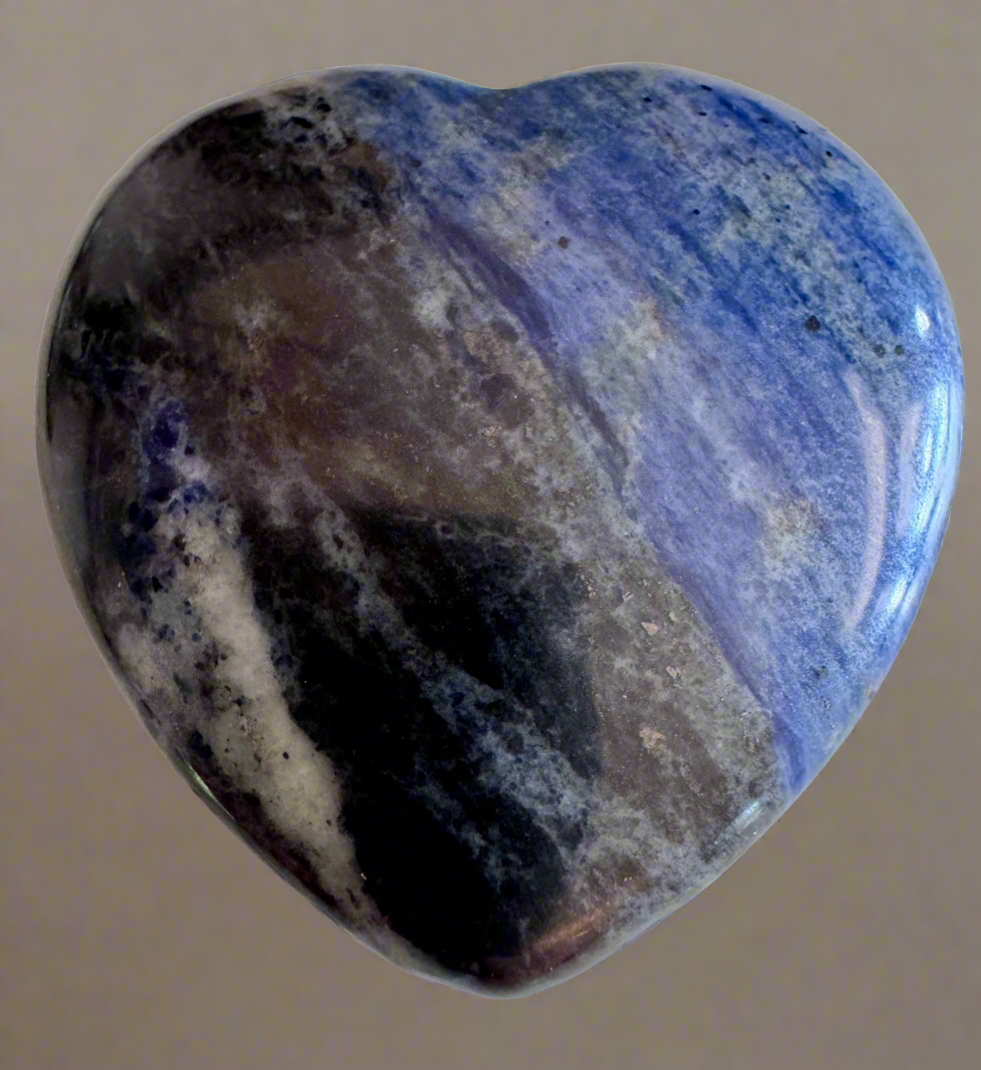 Blue and black sodalite heart-shaped crystal.
