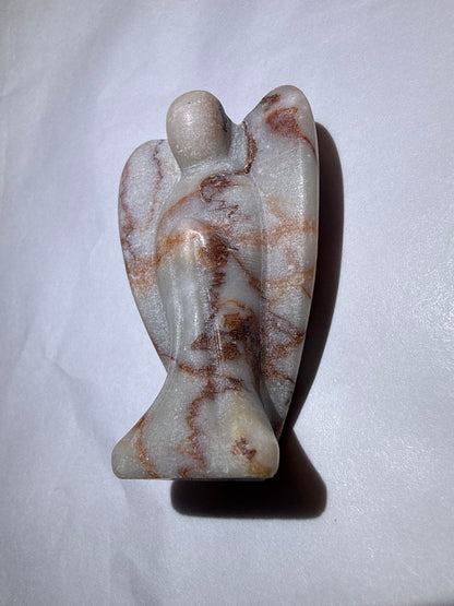 photo of side red vein jasper carved angel 