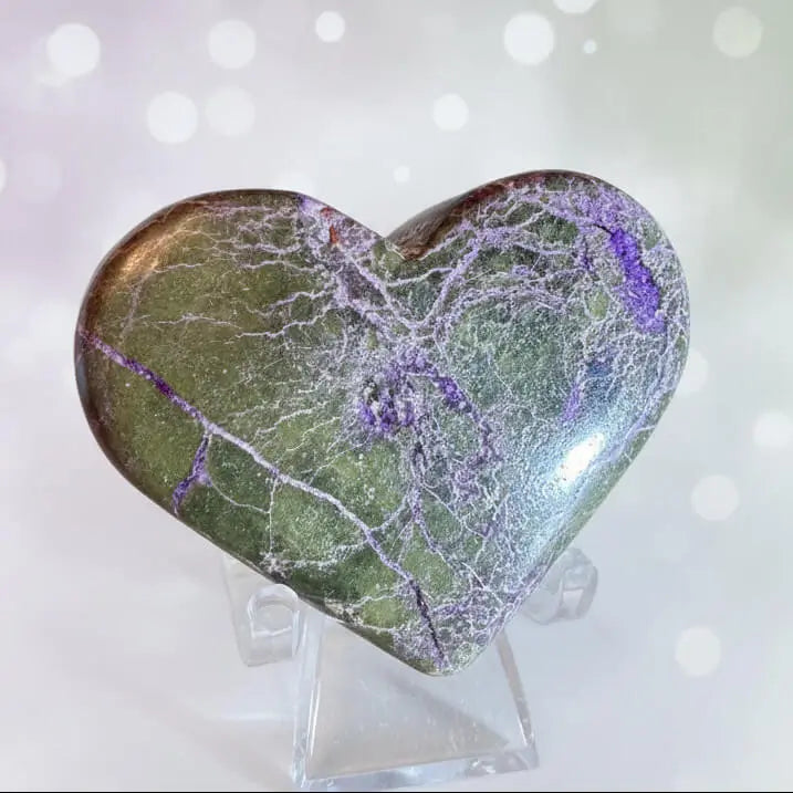 Close up of atlantisite carved heart 