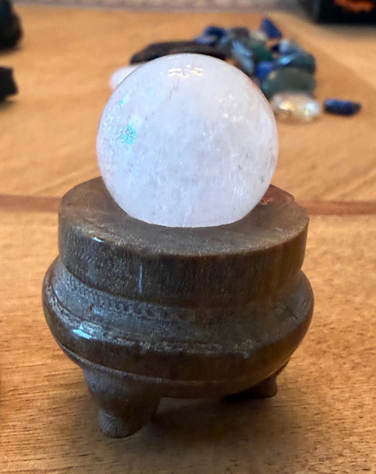close up cauldron and clear quartz sphere