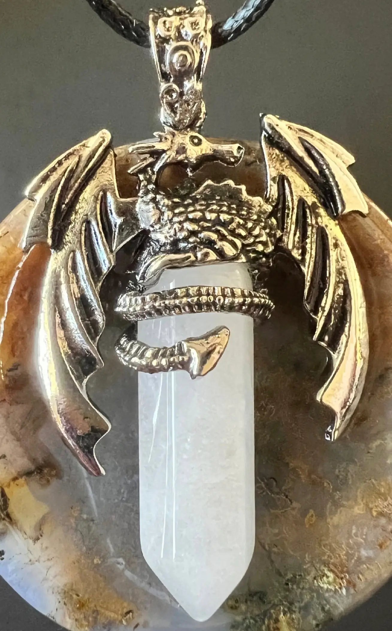 Clear Quartz dragon pendant with silver-tone dragon and cord