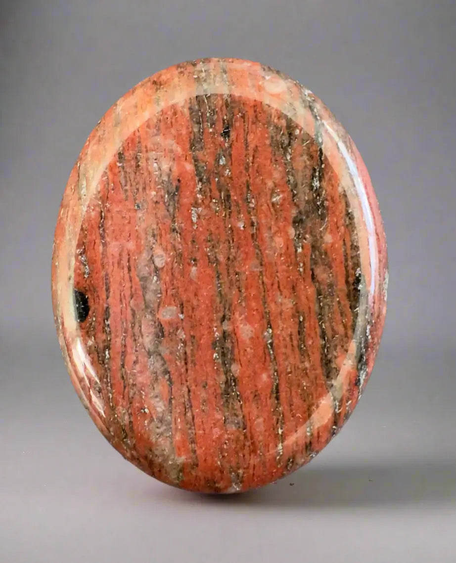 Oval pocket worry stone with polished natural pattern