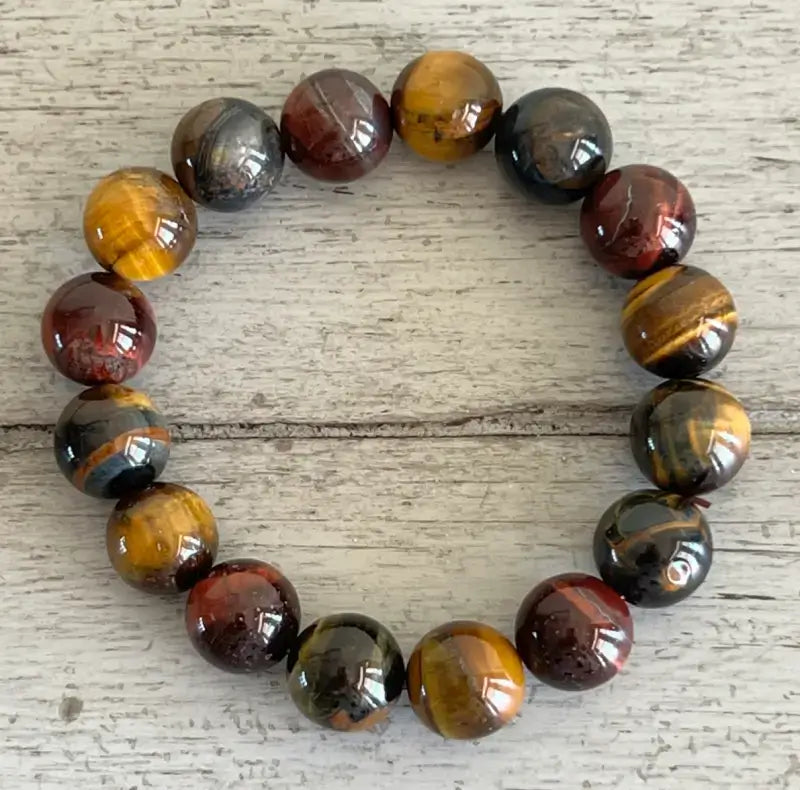 close up of tigers eye bracelet on a wooden table
