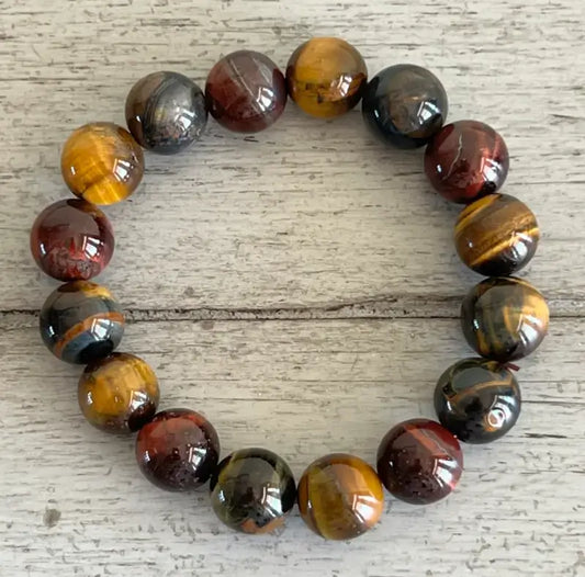 close up of tigers eye bracelet on a wooden table