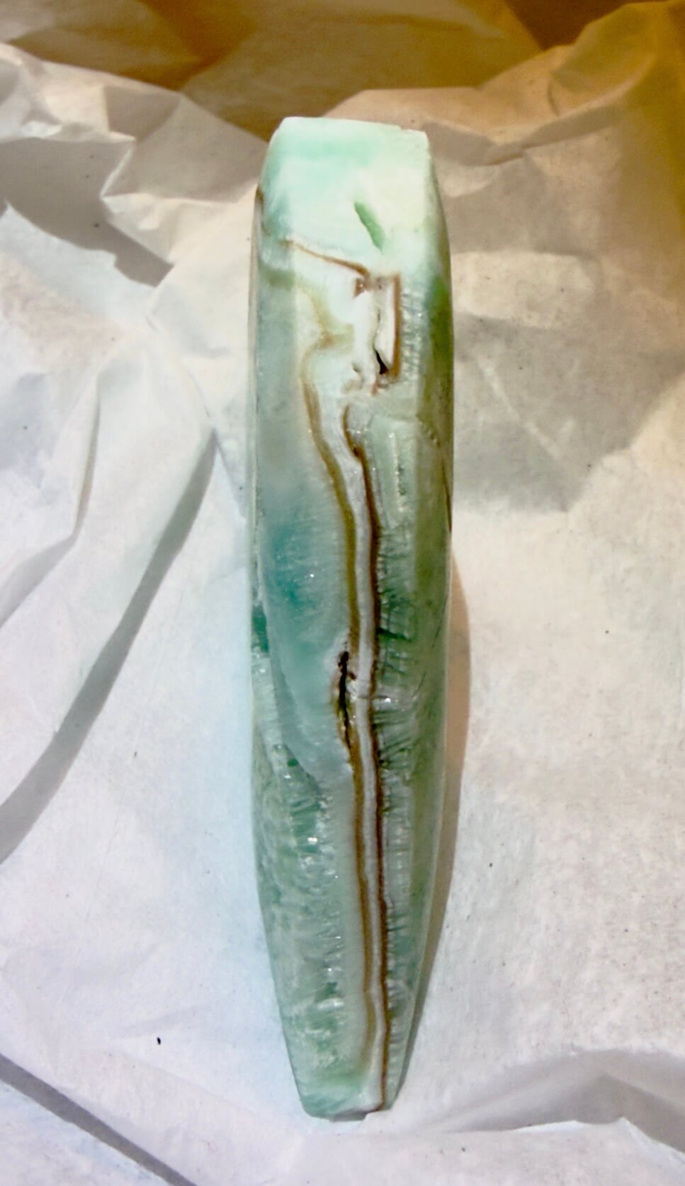 side view of caribbean calcite showing banding or lamela. Blue Calcite and Aragonite banded together