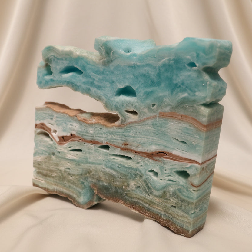 Caribbean Calcite slab with ocean blues and greens 