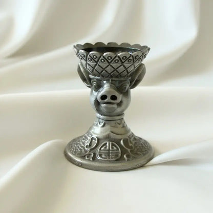 Front view of a chinese zodiac brass sphere holder