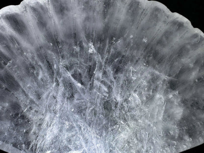 Close up Clear Quartz carved bowl Bowl shaped like a Sea Shell