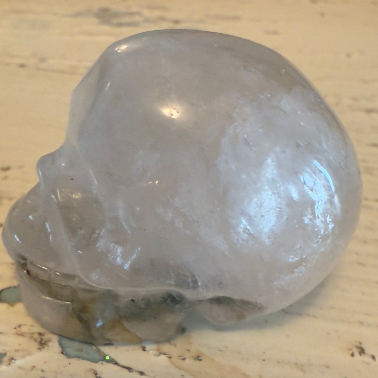 Clear Quartz Skull carving with moss agate inclusions Part of the set 
