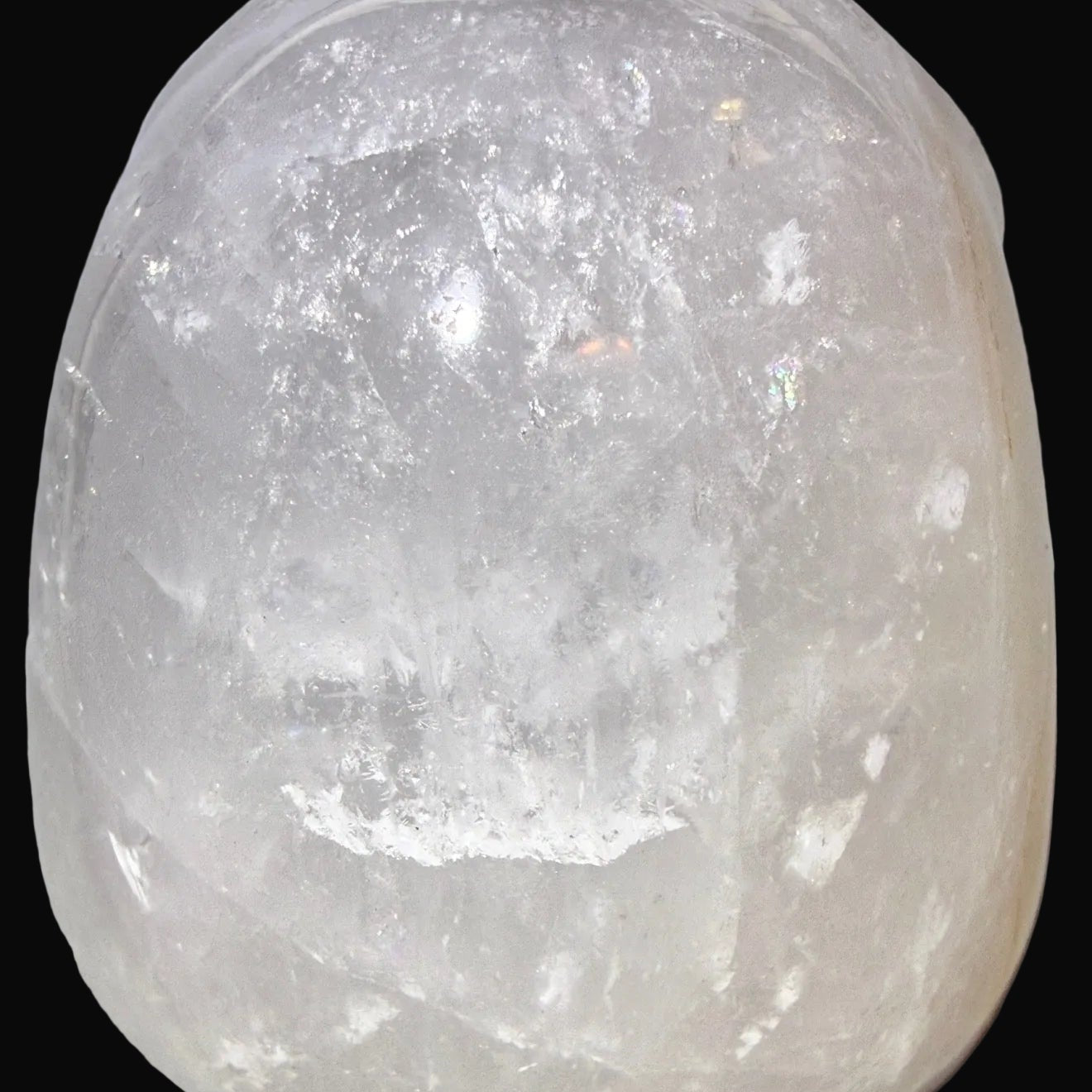 close up of top hand carved clear quartz skull 