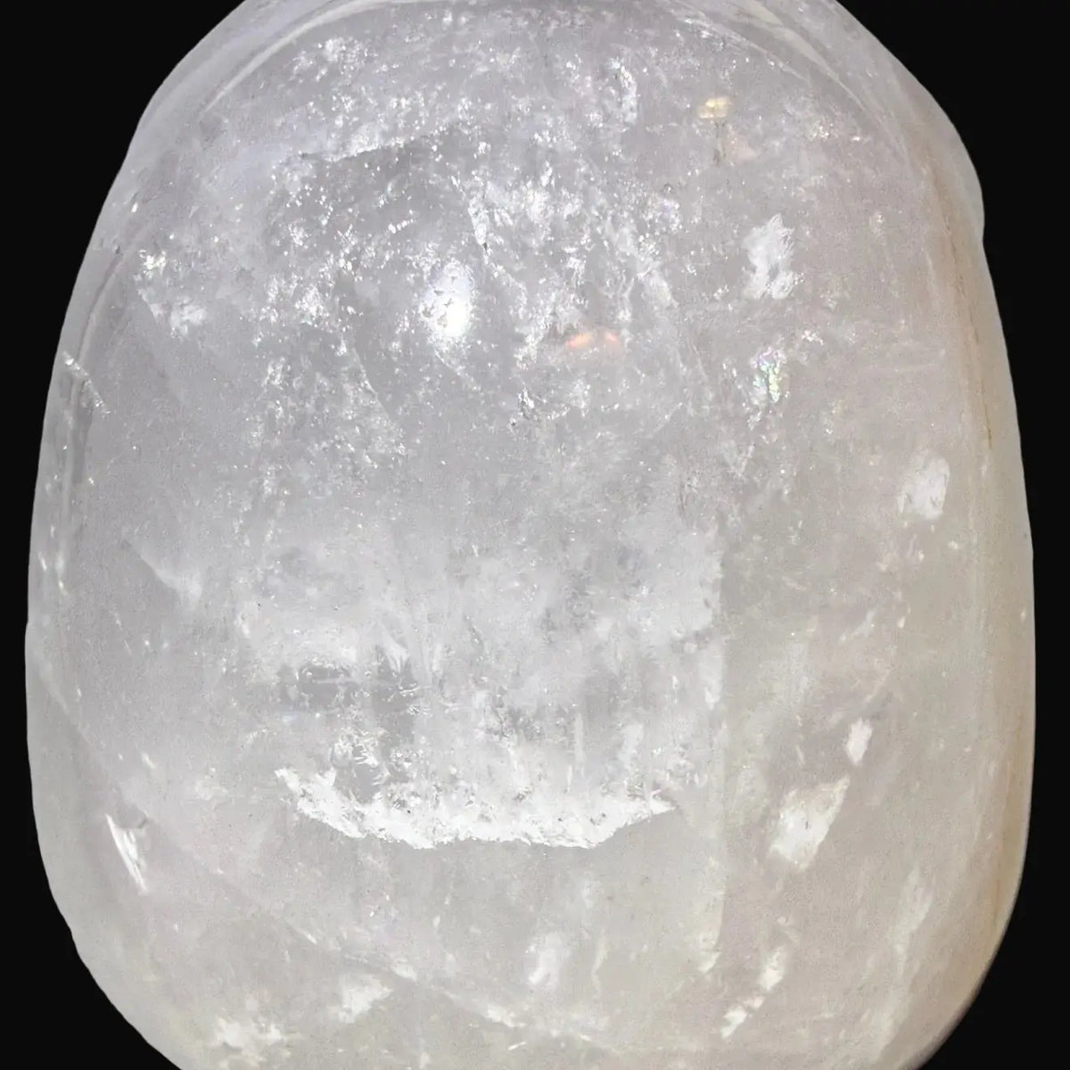 close up of top hand carved clear quartz skull 