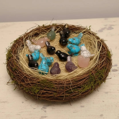 Opalite birds in a cute nest several materials like, black obsidian, turquoise, amethyst, orgone orgonite