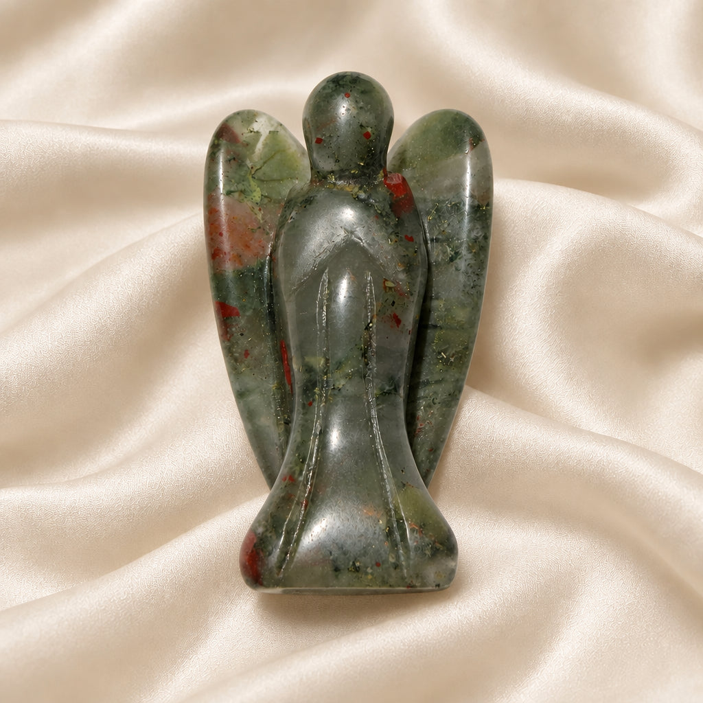 Polished natural bloodstone crystal hand carved, beautiful detail Angel. soft moss green colors and red Iron Oxide inclusions. Green is Jasper 