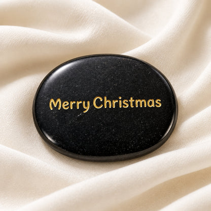 Black Tourmaline worry stone with Merry Christmas etched in a gold tone Merry Chistmas
