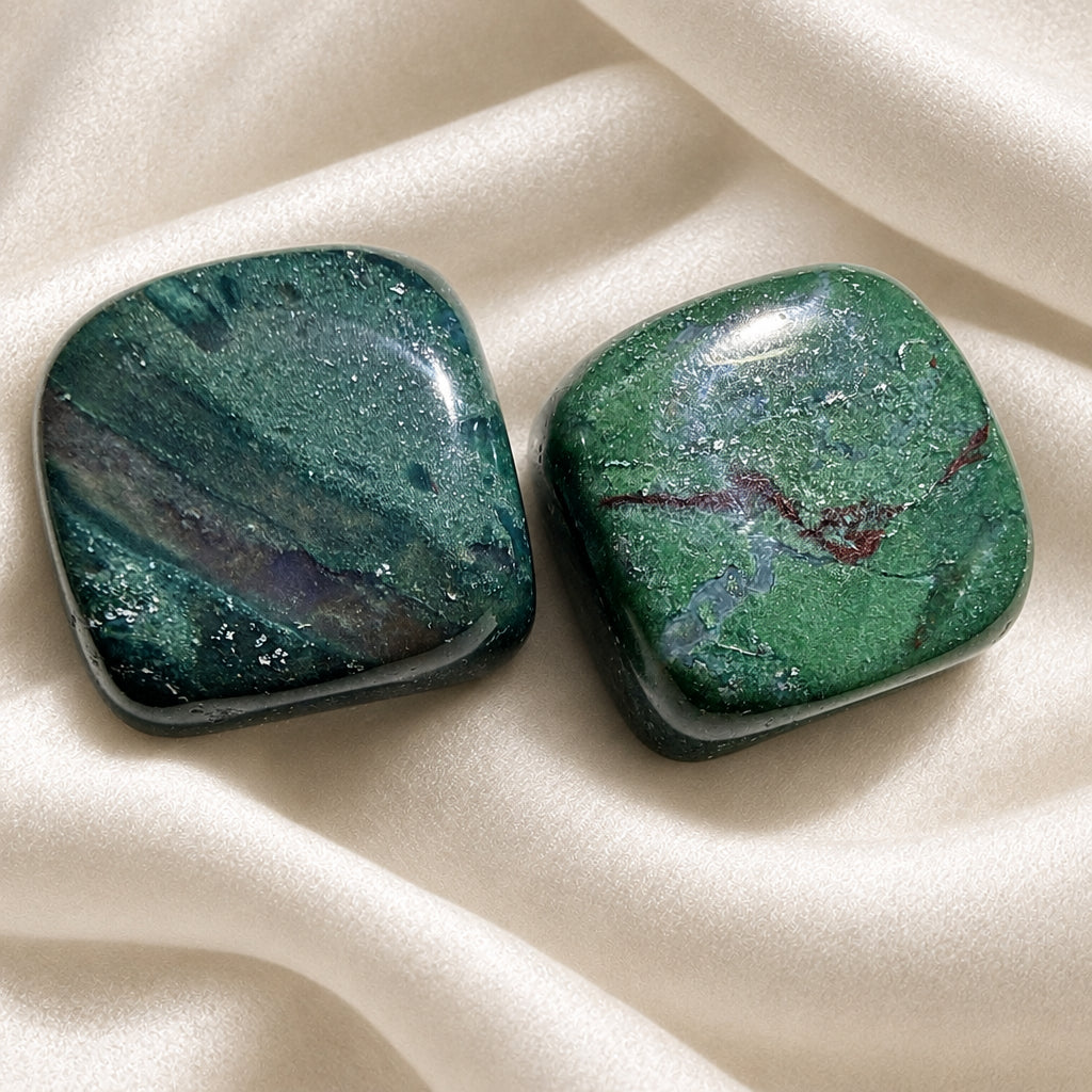 Two square cubes carved from natural green jasper