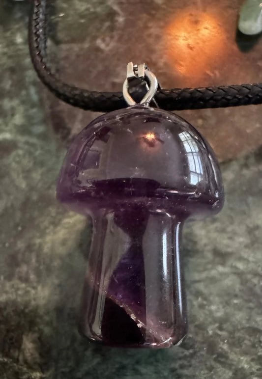Amethyst mushroom pendant on a black waxed leather cord