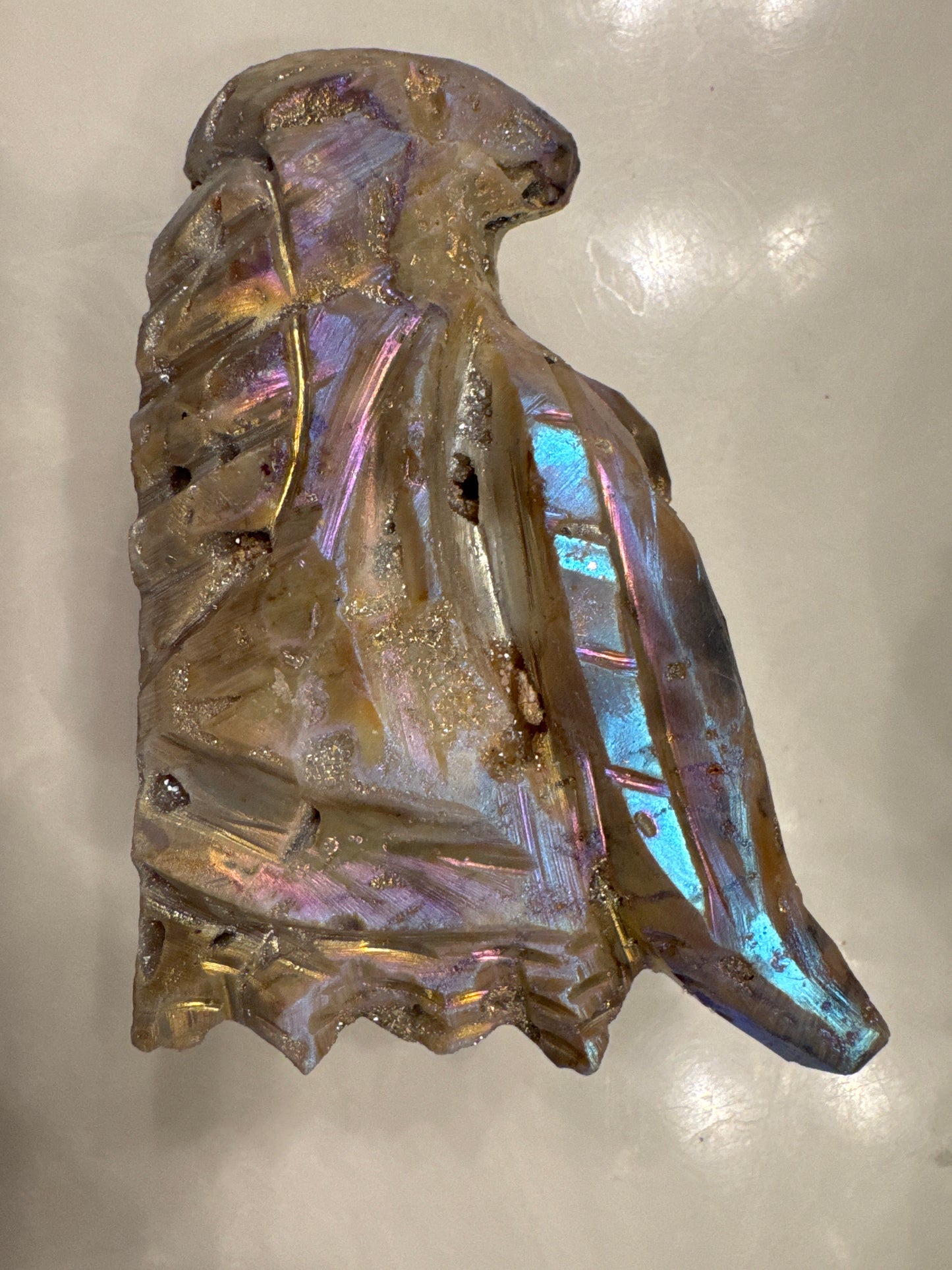 Iridescent art glass eagle sculpture.
