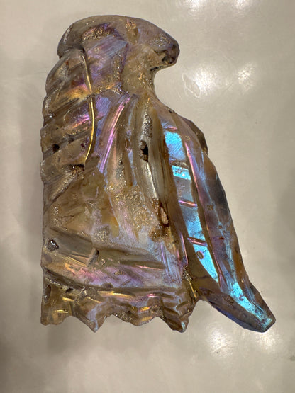 Iridescent art glass eagle sculpture.
