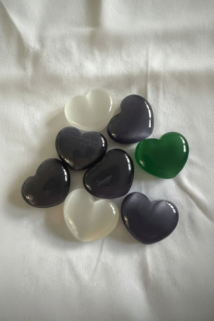 Chatoyant Selenite carved hearts different colors white, purple, green and blue