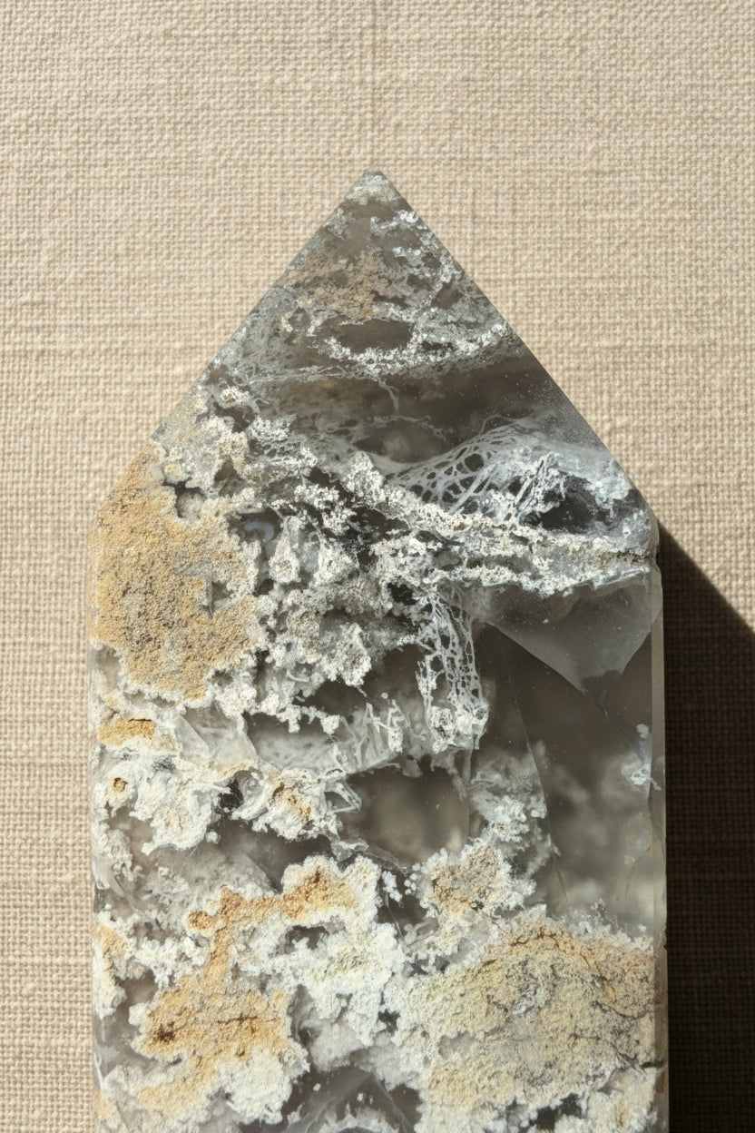 close up of flower agate tower tip showing the intricate  patterns with possible Menganese inclusion 