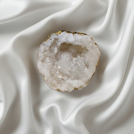 Clear Quartz geode half with sparkling crystal interior