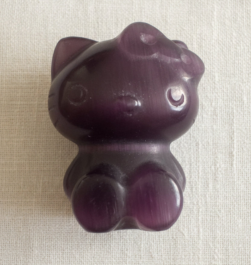 Purple chatoyant selenite hello kitty carving. very rare