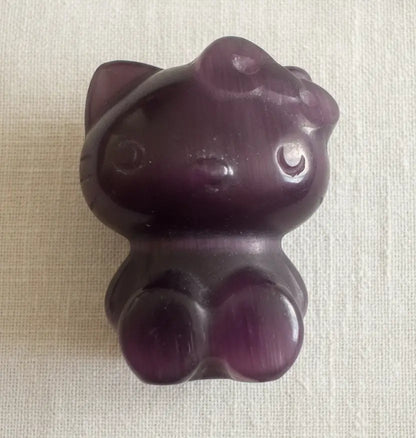 Purple chatoyant selenite hello kitty carving. very rare
