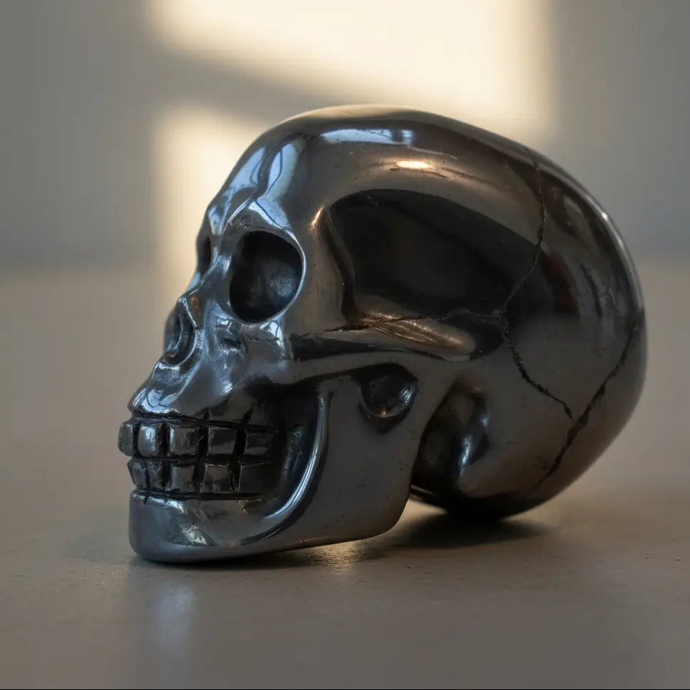 close up of hematite smooth polished silver skull