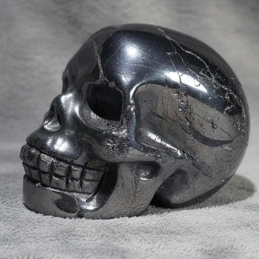 Polished hematite hand carved skulls with partings silver Iron 3 Oxide silver