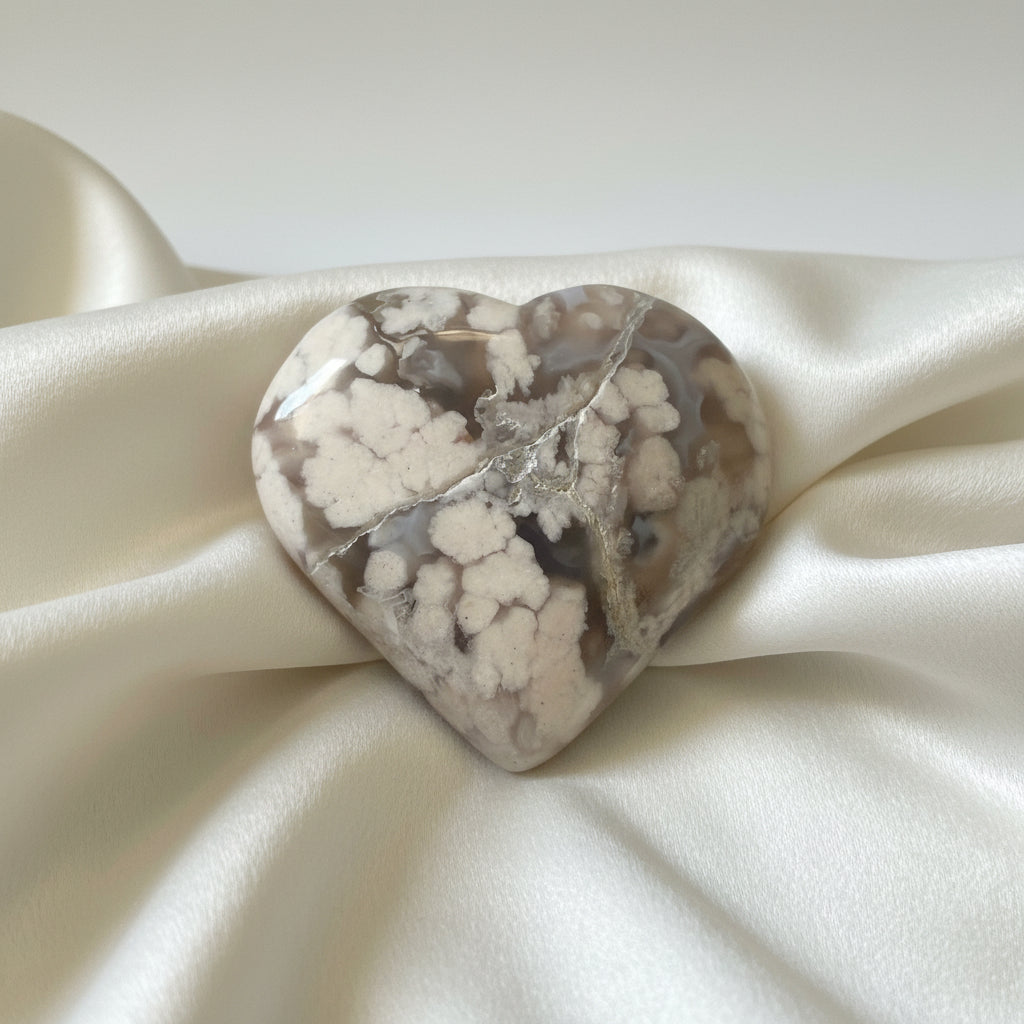 carved Heart shaped flower agate with a natural fracture 